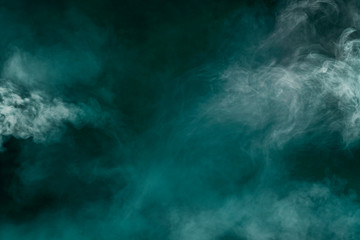 spectacular abstract white smoke isolated in color green background