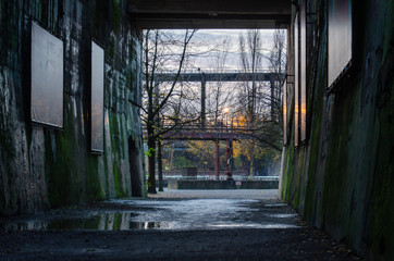 Fototapeta na wymiar Industrial surroundings at sunset and night