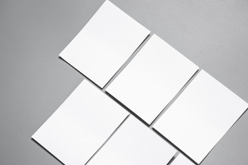 Blank portrait mock-up paper. brochure magazine isolated on gray, changeable background / white...