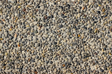 An old pebblestone road cobbled with natural stones