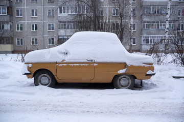 Car ZAZ covered with snow