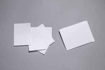 Blank portrait mock-up paper. brochure magazine isolated on gray, changeable background / white paper isolated on gray
