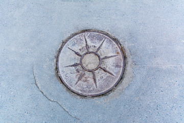 Rusty manhole cap