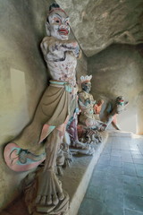 Buddhist characters and Guardian Lion Shishi. Mogao caves-Dunhuang-Gansu province-China-0619