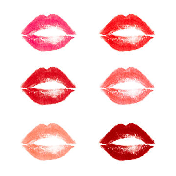 Six print of beautiful lips with shades of red lipstick isolated on white. Concept of kiss, love and passion. Lipstick smear.
