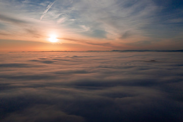 Fototapeta na wymiar Great view of the foggy sunrise sky in the austrian alps