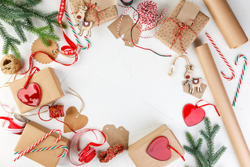 Fototapeta premium Christmas giftbox and presents wrapping in craft paper and decor