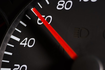 Close-up of the car speed meter. Car speedometer close up, speed 60