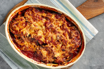 Eggplant casserole with tomato sauce and cheese, mediterranean cuisine.