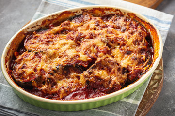 Eggplant casserole with tomato sauce and cheese, mediterranean cuisine.