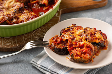 Eggplant casserole with tomato sauce and cheese, mediterranean cuisine.