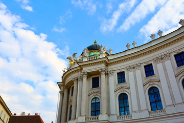 Fototapeta na wymiar Vienna Building with gold statues and dome