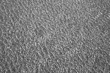 the structure of water in shades of sunlight, the manifestation of texture in the form of abstraction
