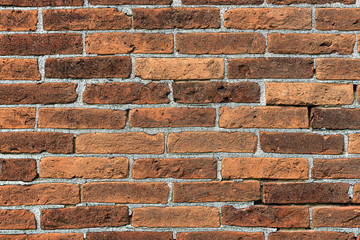 full-frame close-up of old brick stone wall background.