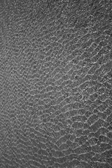 the structure of water in shades of sunlight, the manifestation of texture in the form of abstraction