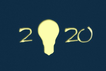 2020. New Year background with numbers and a light bulb on a dark blue background. New Year Ideas Concept. Business. Creation. I