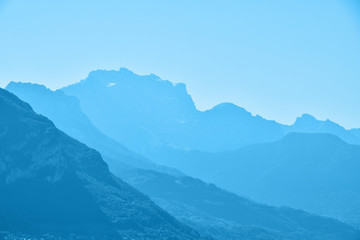 Fototapeta na wymiar Blue toned aerial perspective mountain landscape