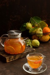 Tea of sea-buckthorn berries with lemon and orange