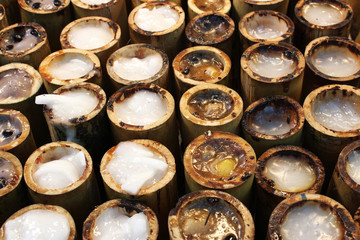 Sweet sticky rice roasted in bamboo joints