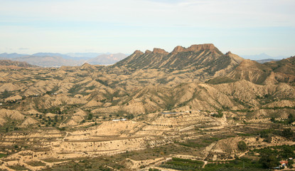 BADLANDS AND MOUNTAINS