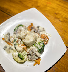 Ravioli with prawn shrimp Seafood, Spinach & Mushrooms in Garlic Cream Sauce