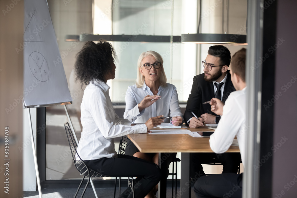 Sticker Diverse multiethnic colleagues talk brainstorming at office meeting