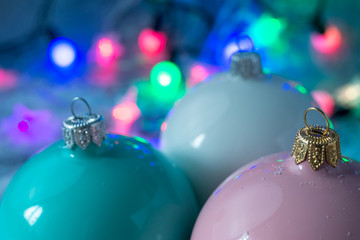 christmas ball on a color lights background