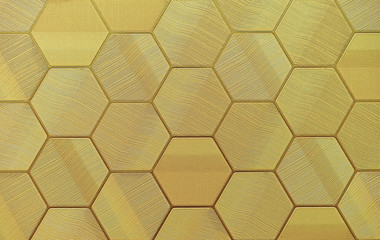 Yellow background with fabric texture and honeycombs.