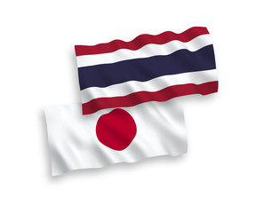 Flags of Japan and Thailand on a white background
