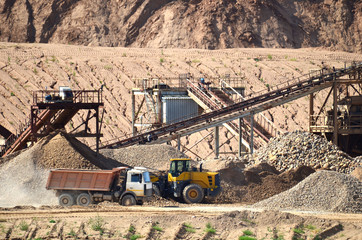 View on the mining quarry for the production of crushed stone, sand and gravel. Crusher plant with...