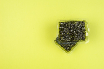 Nori seaweed on a green background.