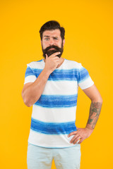 Summer vibes. summer vacation is on. serious sailor. Join my wave. summertime collection. marine style. bearded man hipster yellow background. mature brutal guy striped shirt. male fashion