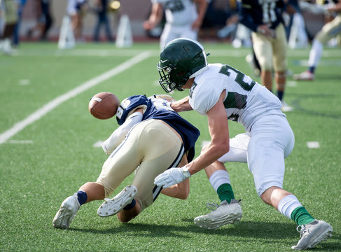 Action photos of high school football players making amazing plays during a football game