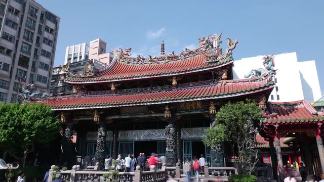 Worshipers at Longshan Temple. The temple was originally built by Fujianese settlers in 1738. 4K hyperlapse
