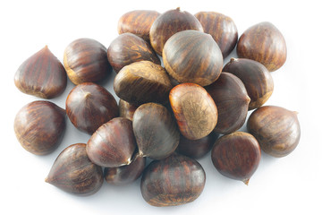 Chestnuts close up. Raw Chestnuts. Fresh sweet chestnuts. Food background.
