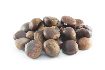 Chestnuts close up. Raw Chestnuts. Fresh sweet chestnuts. Food background.