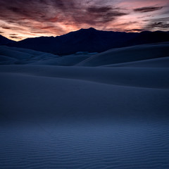 High Contrast Sunrise Over Sand Dunes
