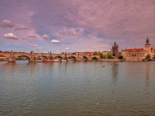 Obraz premium View from Boat to Old Town of East Europe Prague City with stunning sky sunset