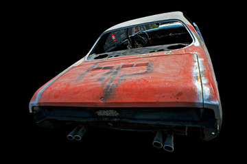 A wrecked junk car in cut out background