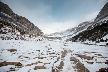 Fototapeta premium Ordesa National Valley in snowy autumn, located in Pyrenees Spain