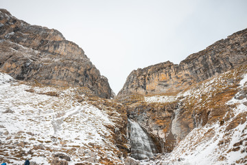 Fototapeta na wymiar Ordesa National Valley in snowy autumn, located in Pyrenees Spain