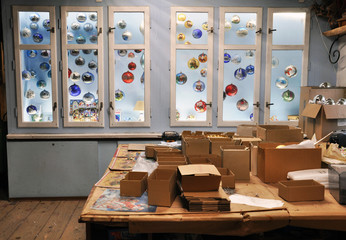The interior of the factory for the manufacture of glass Christmas decorations. Items can go to gift shops for Christmas.