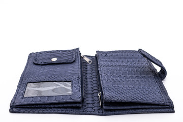 Fashion luxury snakeskin python wallet isolated on a white background.