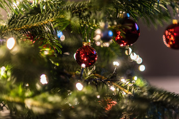 Christmas decorations in the Christmas tree. blurred background photo
