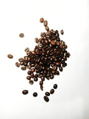 coffee beans in shape of heart isolated on white