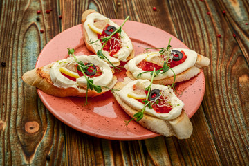 spoon with salmon red caviar, On a wooden background.