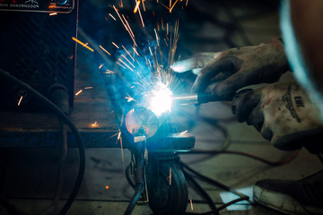 repairing of corrugation muffler of exhaust system in car workshop