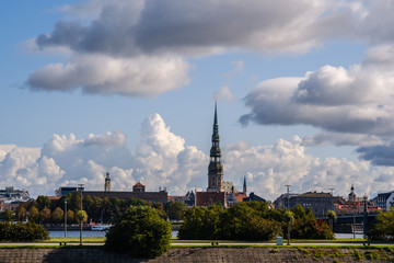 Fototapeta na wymiar Riga on a sunny summer day. View from the left bank of the Daugava.