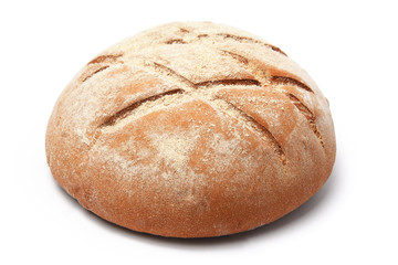 loaf of bread of round shape with a pattern on a white background