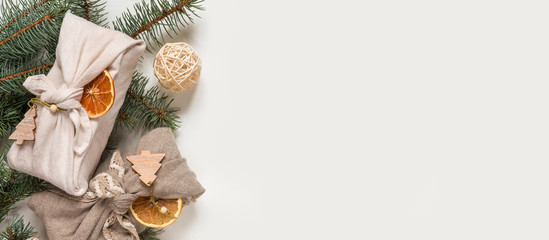 Zero waste, Christmas eco-friendly gift wrapping in traditional Japanese Furoshiki style,...